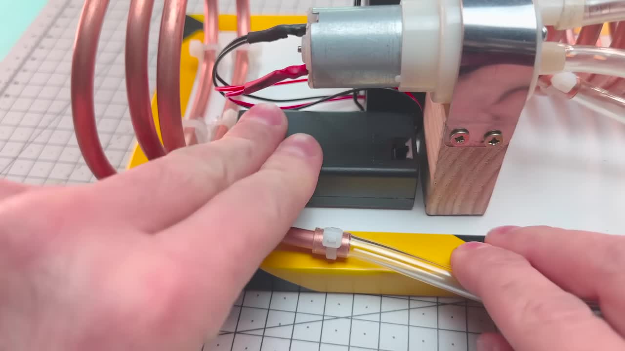 Injecting isobutane gas with a syringe
