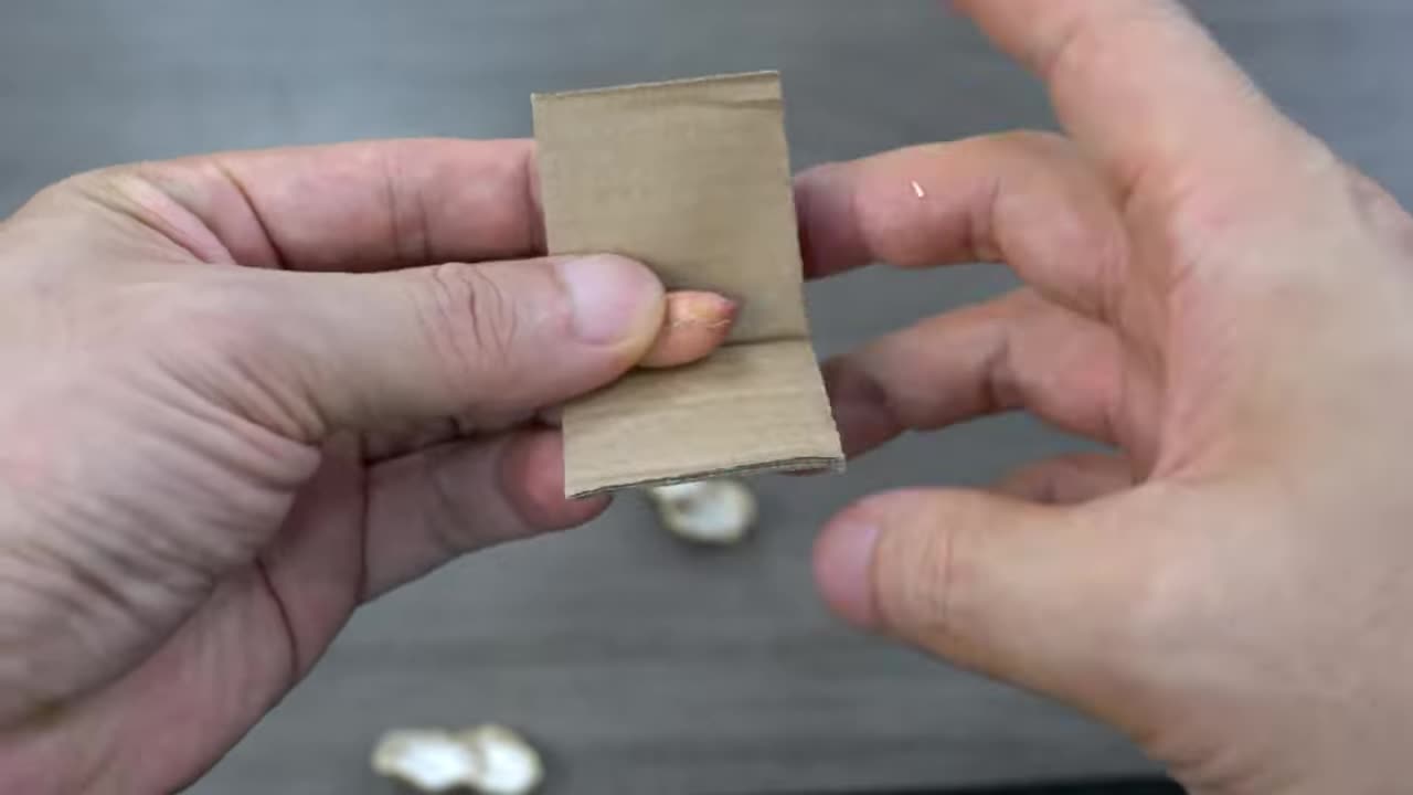 Using a vise and peanuts to shape the plastic fan blade