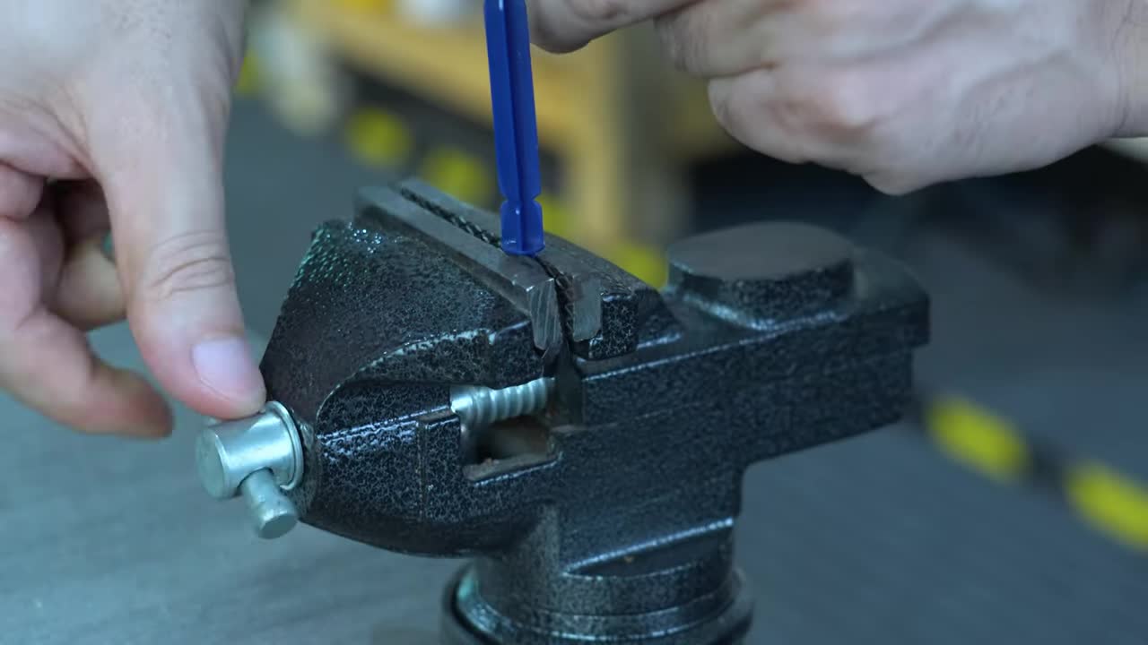 Trimming the plastic fan blade with a utility knife