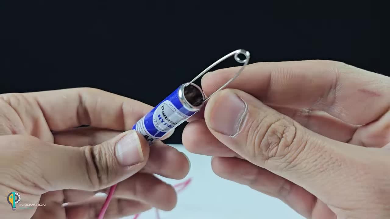 Attach Pin to Battery